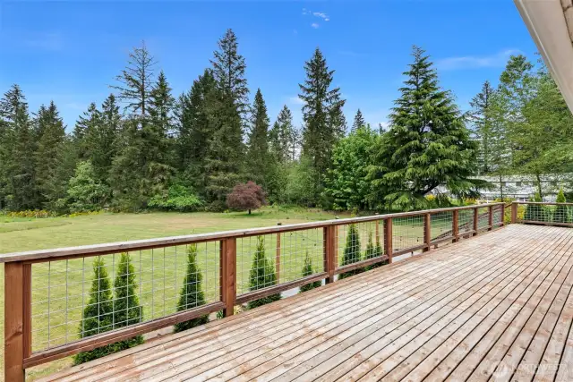 Access to this amazing deck is easy from the primary bedroom.
