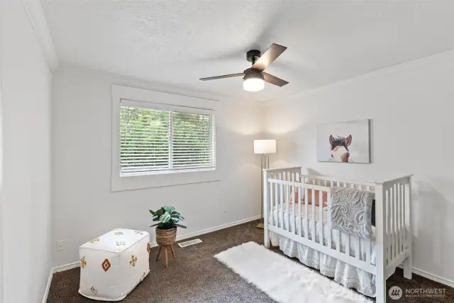 The second of three bedrooms this home includes.
