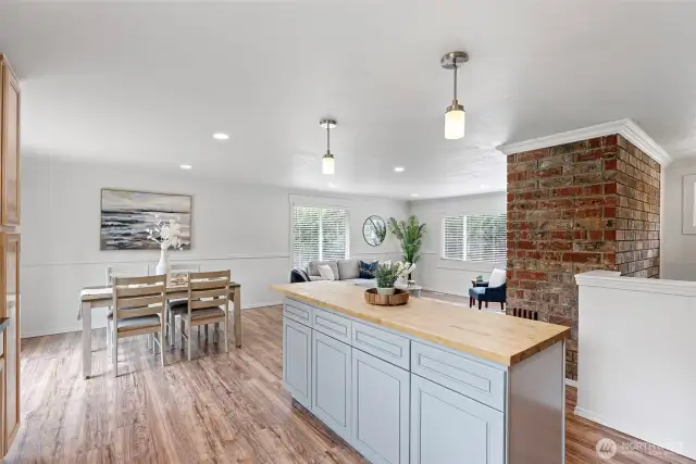 The dining room, living room, kitchen view.