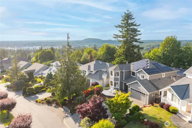 The home is situated in a quiet neighborhood within walking distance to schools, shops, and it has a trail right behind the home!