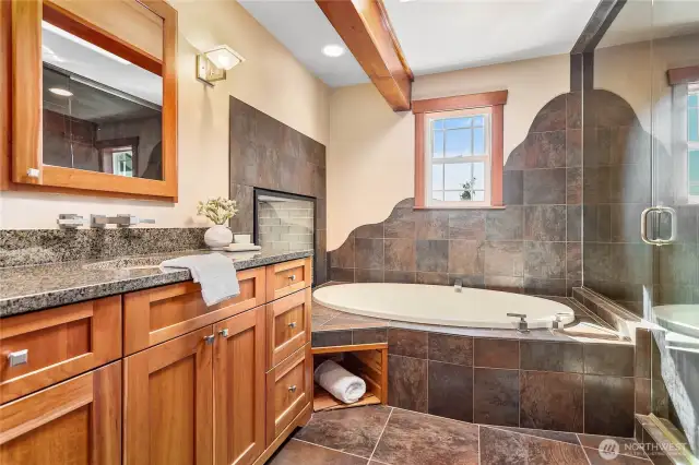 The spa-like   ensuite bathroom with tub and steam shower