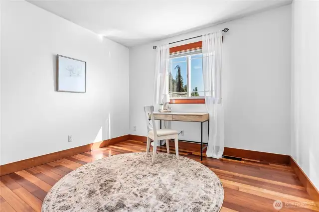 4th bedroom upstairs is staged as a 2nd upstairs office