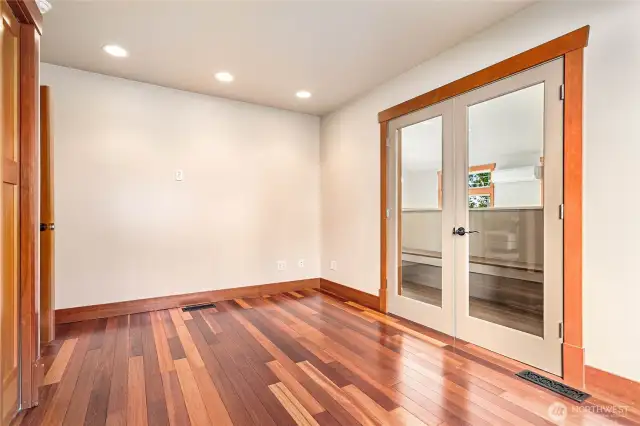 There is another office with 2 closets, and french doors that open to the poolhouse