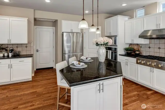 Coffee bar and additional cabinets. Garage access.