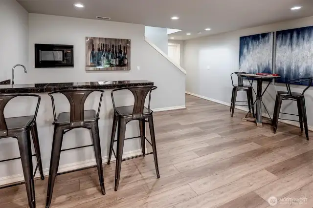 Entertaing space with wet bar and microwave
