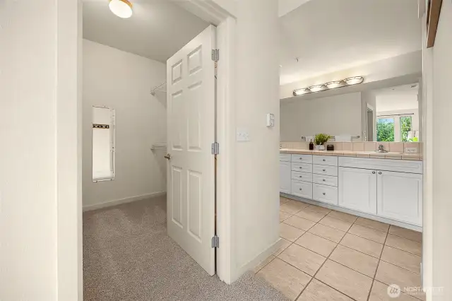 Primary walk-in closet and ensuite.