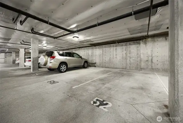 Two assigned parking spots located in the secured lower garage in Building 2.