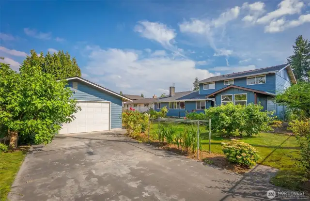 2nd detached garage with curb stamp in sidewalk for easy access.
