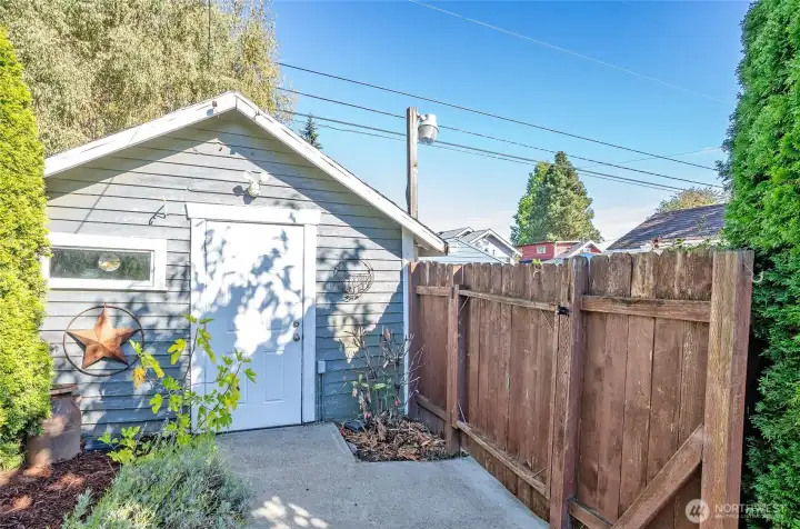 Fenced backyard and 1 car garage