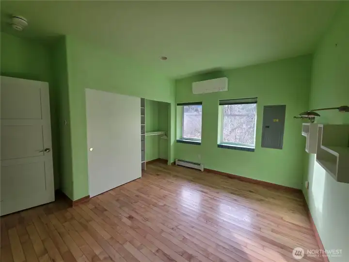 primary bedroom with 2 large closets with organizers