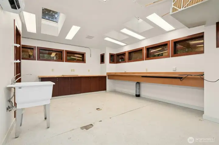 299 square foot separate office/shop space with new dedicated HVAC mini-split unit, ½ bath & storage closet