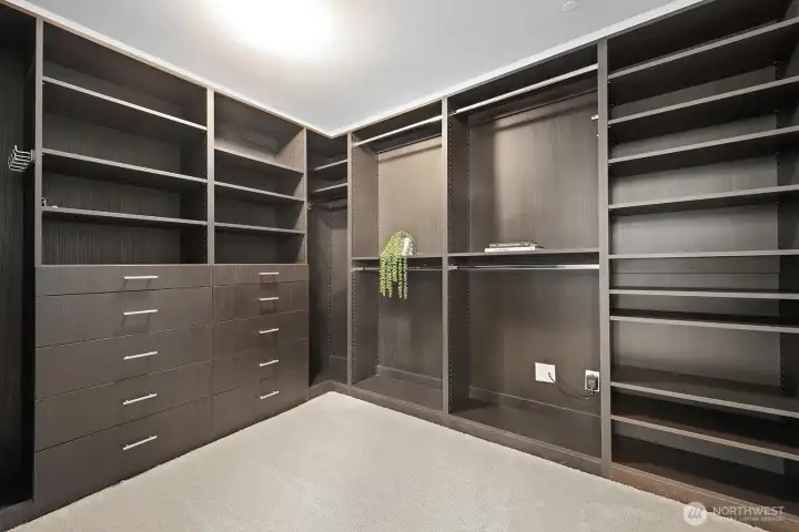 Primary walk-in closet with organizers