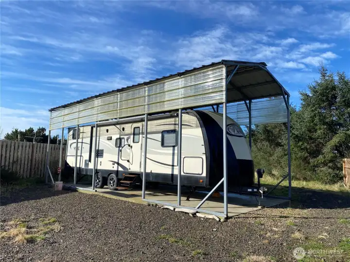 Travel trailer with water spigot nearby