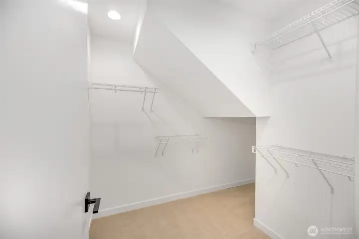 Primary suite walk-in closet.