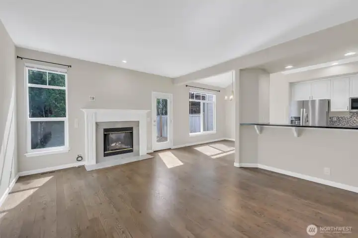 Living room has lots of light and door to backyard.