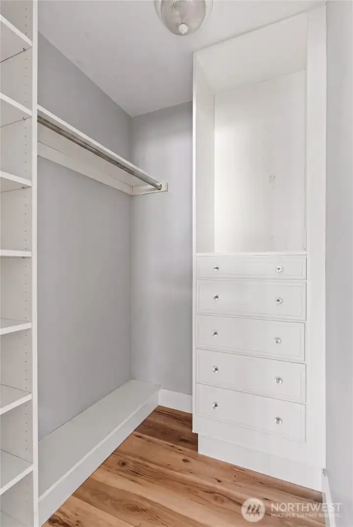 Beautiful walk-in closet in the oversized primary Beautiful walk-in closet in the oversized primary