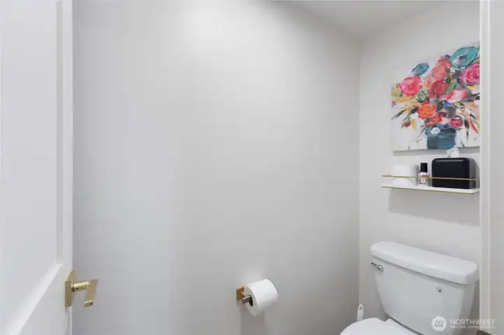 Private toilet room located within the primary bathroom.