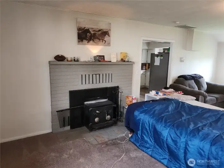 Cozy up to the wood fireplace