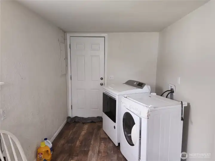 Half of the utility room, door leads to back porch.