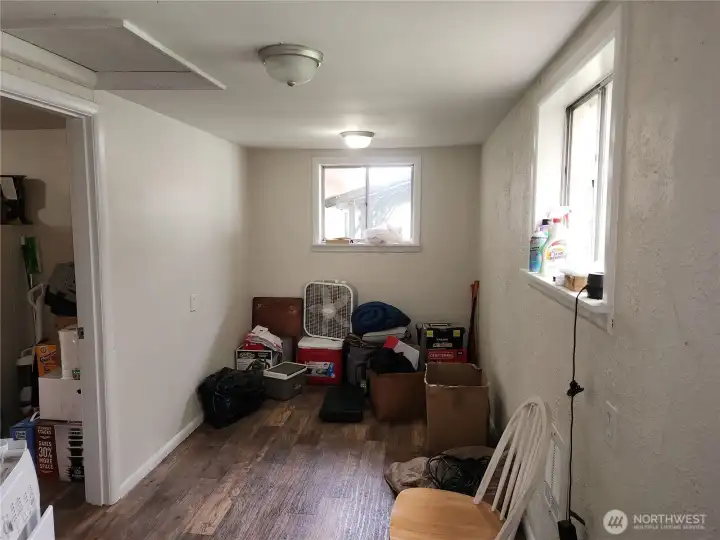 Other half of the utilty room has plenty of space for a sitting area or office