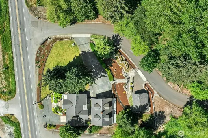 3BD/2BA home w/1-car garage, 30'x40' detached shop with 660sf unfinished upper level, 3rd structure is a detached 2-car garage.