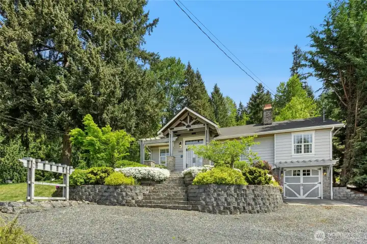 Permitted sign (far left) ready for your home-based business (buyer to verify). Ample off street parking here.