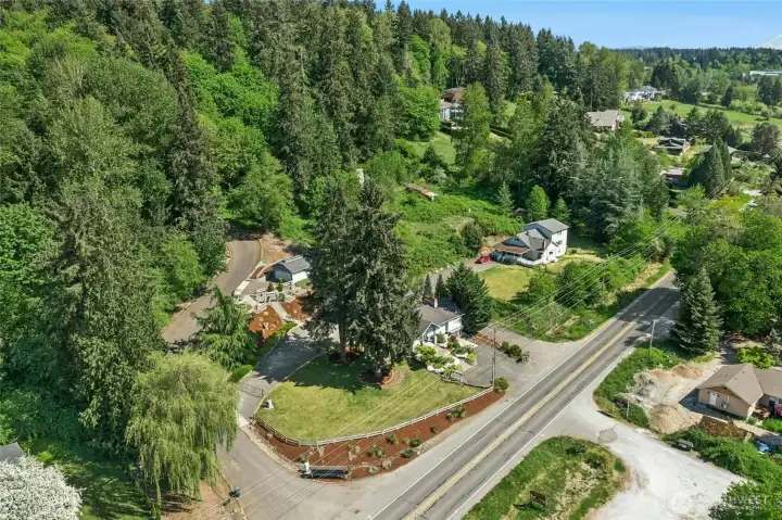 Shy acre on a corner lot with no HOA just 1 mi to the new Somm Hotel.