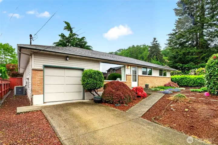 Attached 1-car garage provides secure parking, additional storage space, and flexibility for hobbies, tools, or extra gear while still leaving ample driveway parking available.