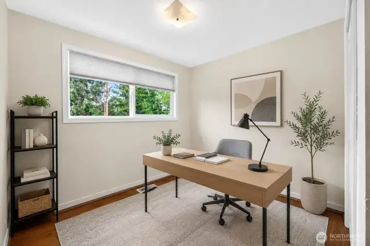 Flexible room ideal for a guest bedroom, home office, or creative workspace with beautiful natural light throughout the day.