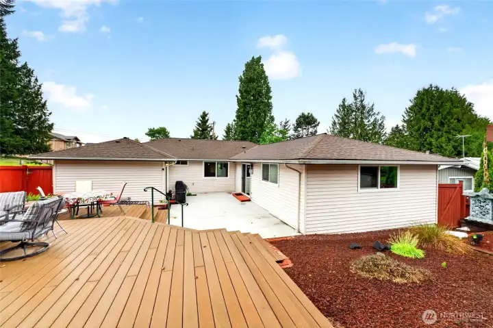 Expansive entertaining deck creates the perfect setting for outdoor dining, weekend get-togethers, and quiet evenings enjoying the fresh air.