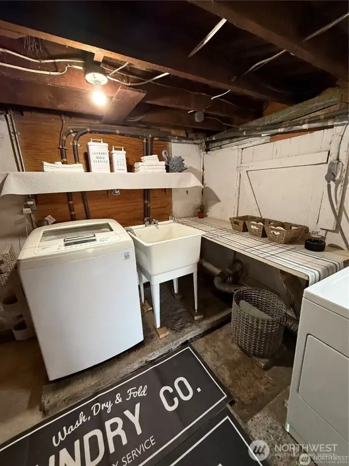 Laundry room in basement