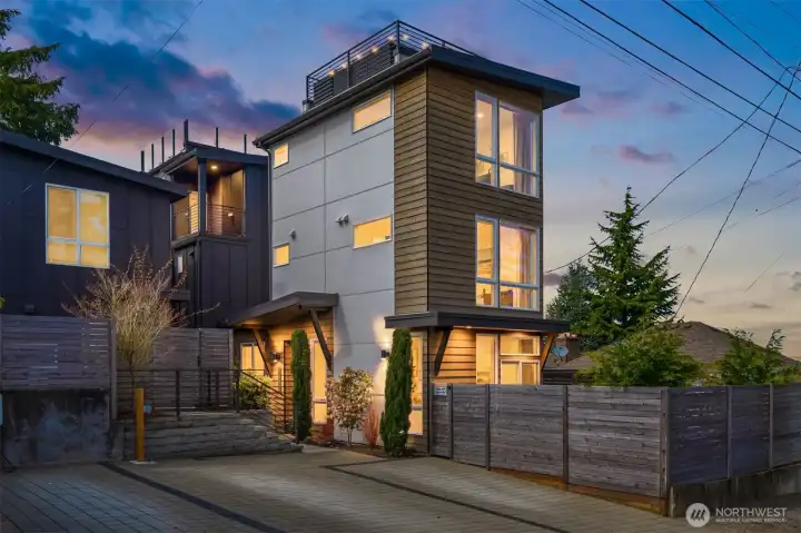 A standout from the typical West Seattle townhome crowd, this 2022-built view Gatewood home offers something rare: it simply does not feel like a typical congested townhome community. Blending beautifully into a streetscape of established single-family homes, it feels more special, residential, and elevated than buyers usually expect. EV-charger-ready parking setup and a built-in outdoor storage area for outdoor gear checks boxes that matters more and more to modern buyers.