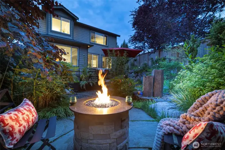 The gas firepit is the place to hang out and watch the afterglow of the sunsets and enjoy the feel of your own resort-like backyard!