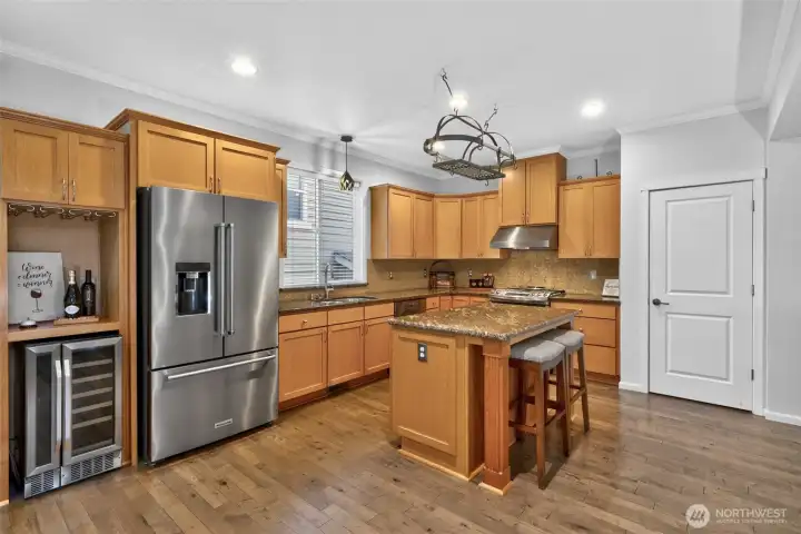 Excellent space here for the chef AND the guests! Pantry door in the background.