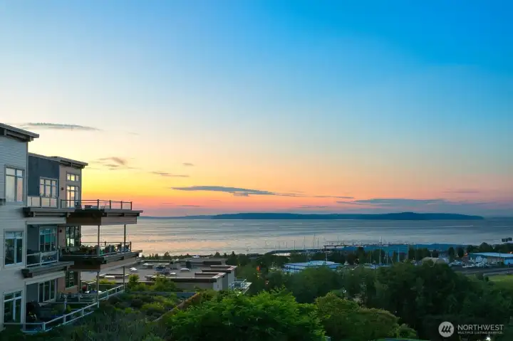 Unit #309 Top-corner residence shown in the photo. Beautiful sunset views across Puget Sound and the Edmonds waterfront.
