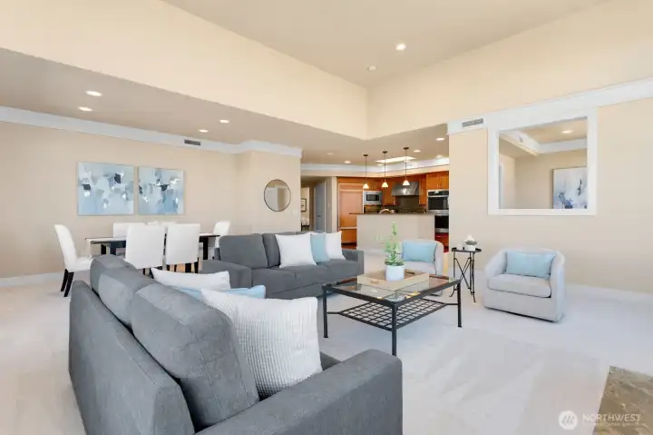Open living and dining spaces with easy flow to the kitchen and outdoor deck.