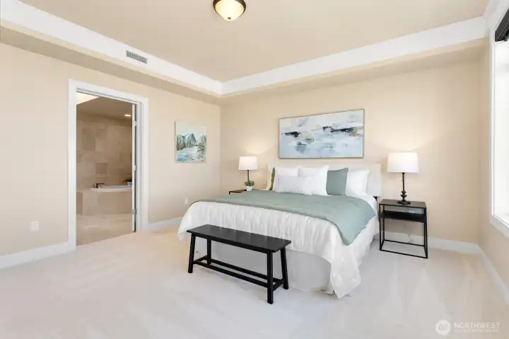 Spacious primary suite with a peaceful retreat-like feel.