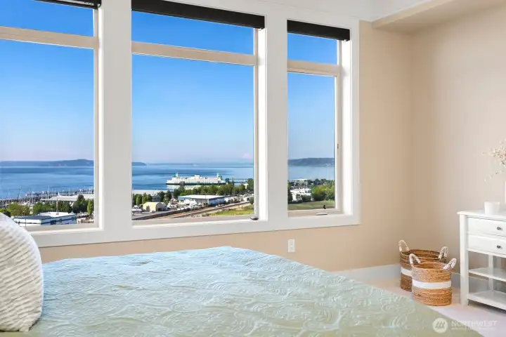 Enjoy ferry, waterfront and Mt Baker views directly from the primary suite.
