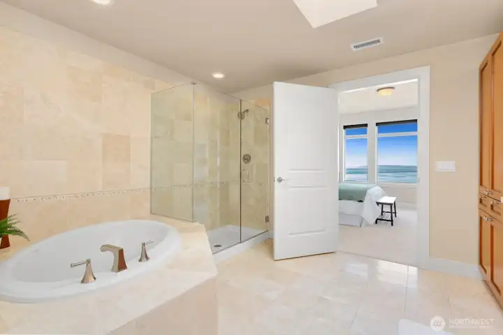 Even the primary bath enjoys a view.