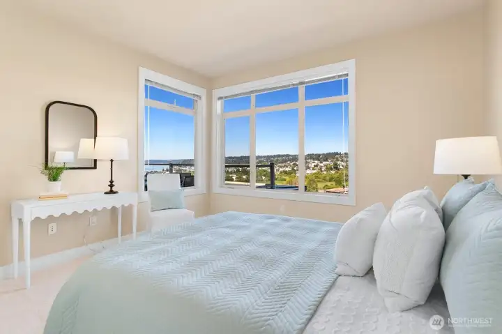 Comfortable second bedroom with natural light.