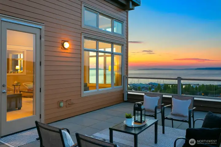 Oversized corner deck with water and gas hookups for outdoor living.