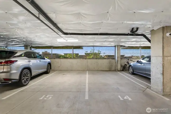 Two secure parking spaces situated just steps from the elevator.