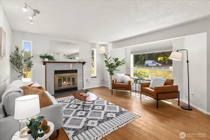 Unit 2: Living Room showcasing engineered scraped wood flooring. Unit 2: Living Room showcasing engineered scraped wood flooring.