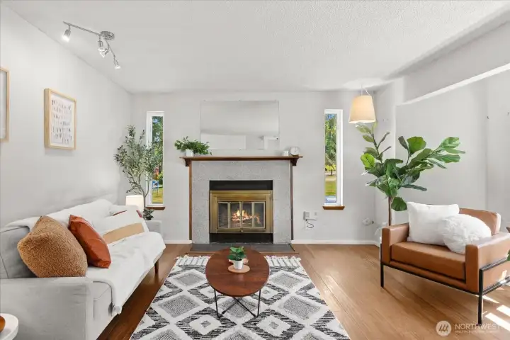 Unit 2: Living Room with woodburning fireplace. Unit 2: Living Room with woodburning fireplace.