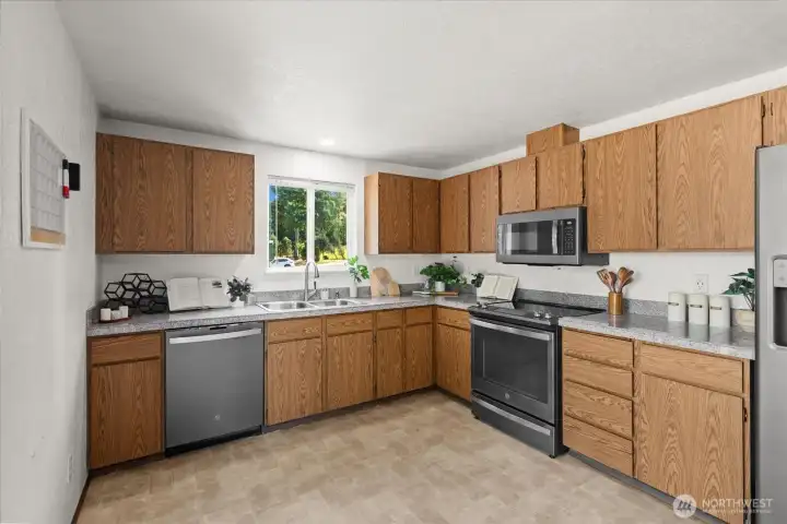 Unit 2: Kitchen with stone tiled countertops. Unit 2: Kitchen with stone tiled countertops.