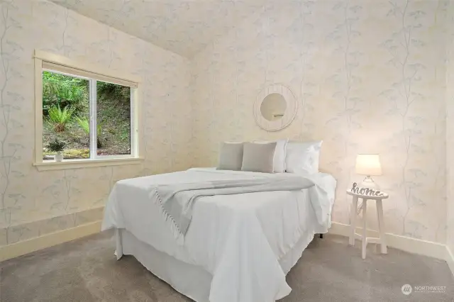 Charming Primary Bedroom on the Upper Level.