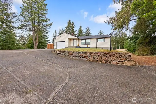 Extended driveway entrance to home