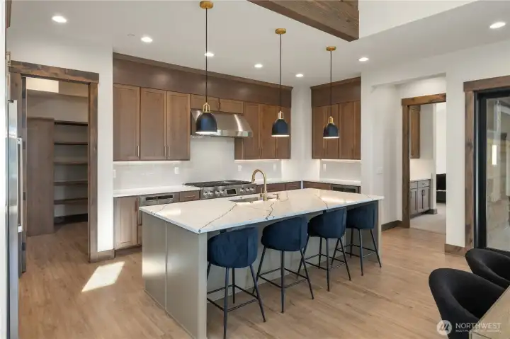 Images are references of an already built home at 421 Southern Star, showcasing interiors for presale.