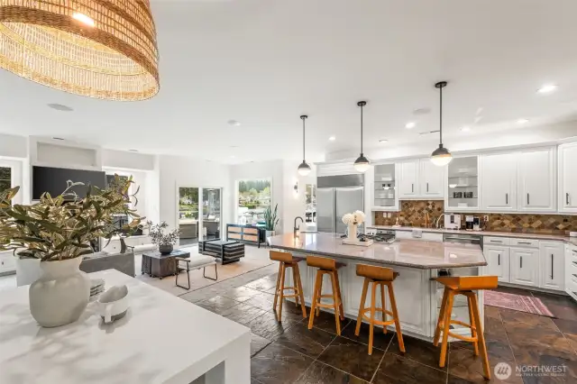 The kitchen offers space to eat around a table or more casually at the countertop