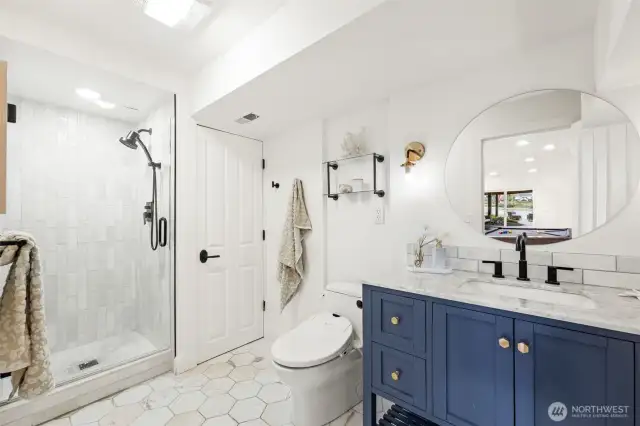 One of two lower level 3/4 bathrooms